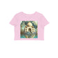 The Intelligentsia pink crop top with a surrealist Taj Mahal and elephant graphic. Features a white elephant resting in water before the iconic monument.